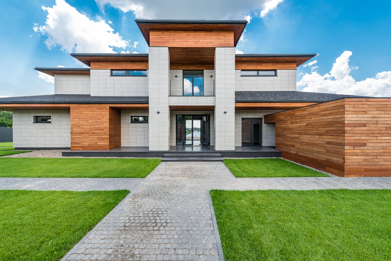 PRMG Modern Mansion with Manicured Lawn